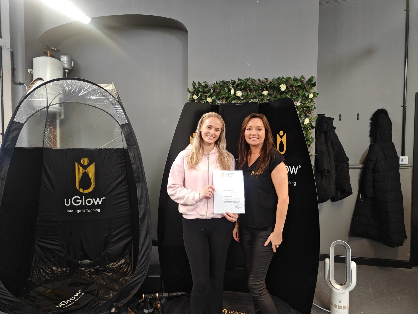 Louise Cooper, uGlow founder, with Megan Oxley holding her uGlow training certificate